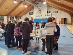 Hearts Afire group from All Saints Catholic Church packing hygiene kits 